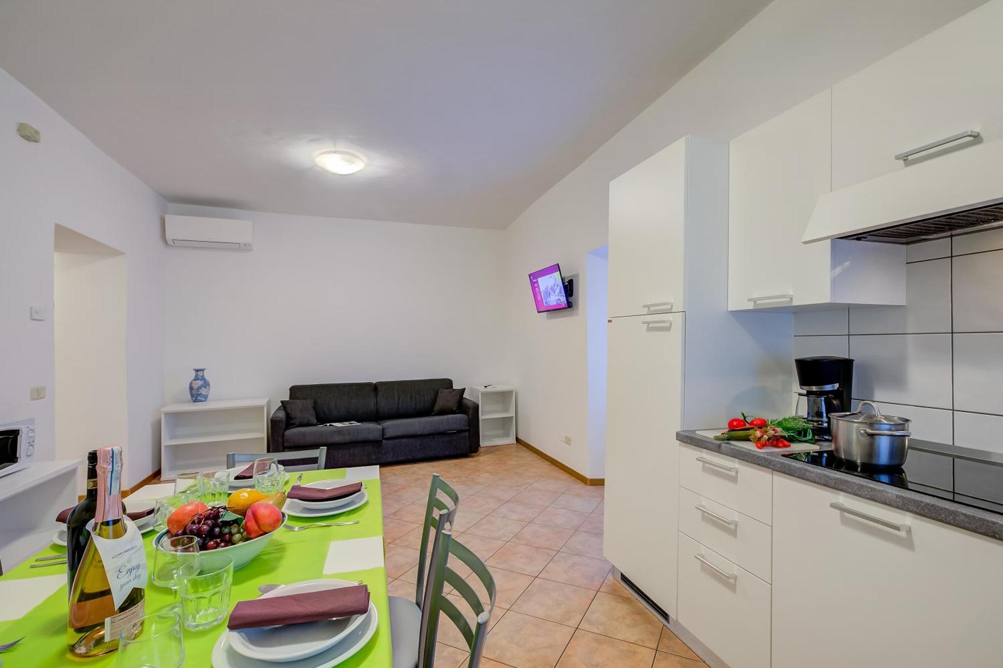 Aparthotel Casa Alpino Riva del Garda Esterno foto